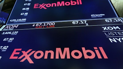 The ExxonMobil logo appears above a trading post on the floor of the New York Stock Exchange, Oct. 8, 2019.