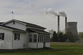 A home sits near the Gen. James Gavin Power Plant, a coal-fired power plant, April 14, 2025, in Cheshire, Ohio.