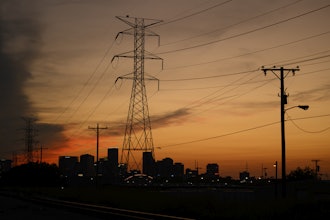 Electrical power lines string across the landscape near downtown Sunday, Aug. 11, 2024, in Nashville, Tenn.