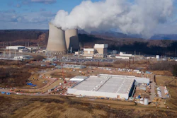 A data center owned by Amazon Web Services, front right, is under construction next to the Susquehanna nuclear power plant in Berwick, Pa., on Jan. 14, 2025.