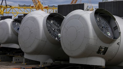 Wind turbine components sit at New London State Pier, April 16, 2025, in New London, Conn.