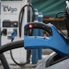 In this photo provided by VTDigger, an electric vehicle is seen plugged into a fast charger in Rutland, Vt., Feb. 17, 2022.