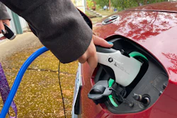 Rebecca DeWhitt charges her electric vehicle on Sept. 30, 2022, in the driveway of the Portland, Ore., home she rents.