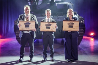 BAE Systems Hägglunds Managing Director Tommy Gustafsson-Rask, Czech Defence Minister Jana Černochová, and Swedish Defence Minister Pål Jonson in front of the first CV9030 MkIV vehicle.