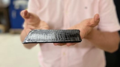 Dr. Mohammad Naraghi showcasing ATSP, the carbon-fiber smart plastic.
