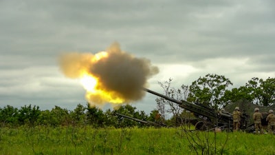 Firing of the M777 lightweight 155mm howitzer.