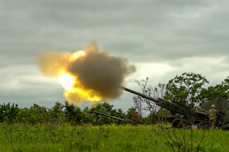 Firing of the M777 lightweight 155mm howitzer.