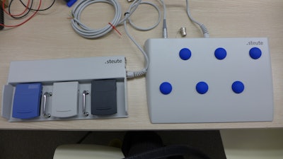 A photo of the Steute foot pedal and button pad on the International Space Station.