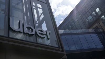 An Uber sign is displayed at the company's headquarters in San Francisco, Sept. 12, 2022.