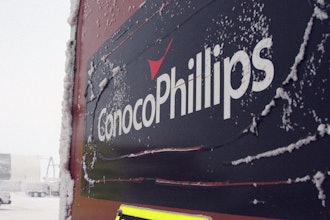 An ice-covered ConocoPhillips sign is displayed at the Colville-Delta 5, more commonly known as CD5, drilling site on Alaska's North Slope, Feb. 9, 2016.