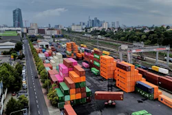 Containers are piled upon a cargo terminal in Frankfurt, Germany, Tuesday, Sept. 9, 2025.