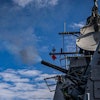 The Arleigh Burke-class guided-missile destroyer USS Rafael Peralta (DDG 115) fires a Phalanx Close-In Weapons System (CIWS) during a live fire exercise.