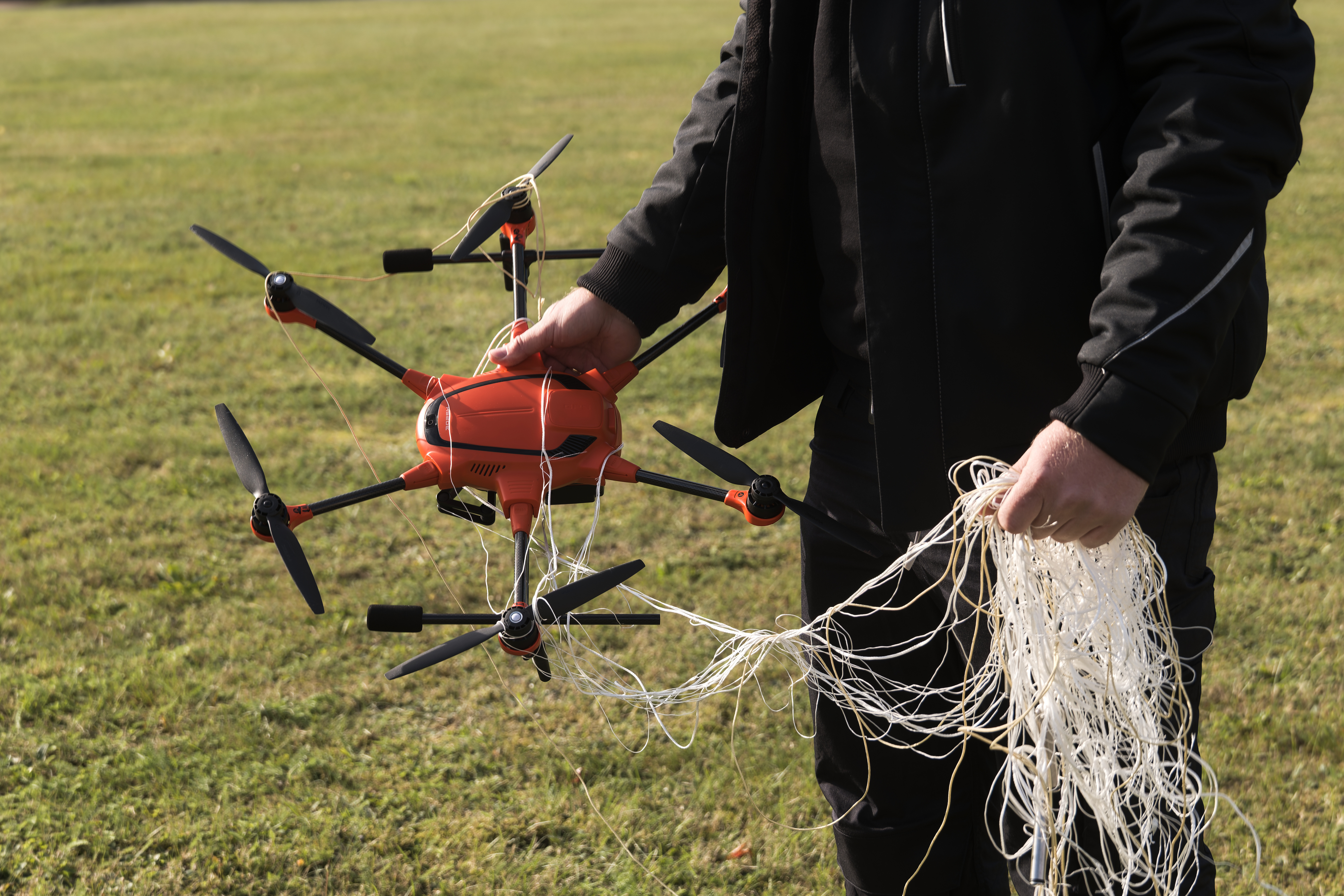 A person presents the interception of a drone by the A1-Falke interception drone from Argus Interception on the second day of the large-scale German forces Bundeswehr exercise 'Red Storm Bravo' in Hamburg, Friday, Sept. 26, 2025.