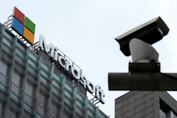 A security surveillance camera is seen near the Microsoft office building in Beijing, July 20, 2021.