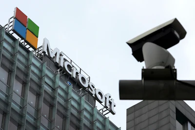 A security surveillance camera is seen near the Microsoft office building in Beijing, July 20, 2021.