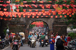 Vietnamese ride two-wheelers in the Old Quarter area in Hanoi, Vietnam, on Sept. 1, 2025.