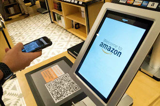 Daniel Thorpe, of Hoboken, N.J., uses the Amazon app to pay for his purchase at the Amazon 4-star store in the Soho neighborhood of New York, on Sept. 27, 2018.