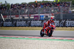 A Ducati model on the MotoGP track.