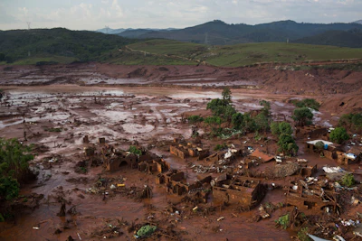 Debris is visible after a dam burst at the small town of Bento Rodrigues in Minas Gerais state, Brazil, Nov. 6, 2015.