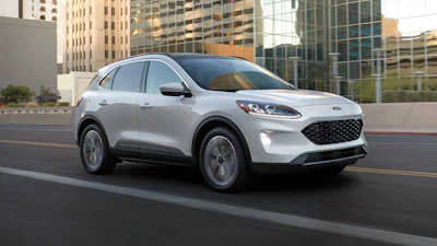 This photo provided by Ford shows the Escape, a compact SUV available as a hybrid on the used market for less than $25,000.