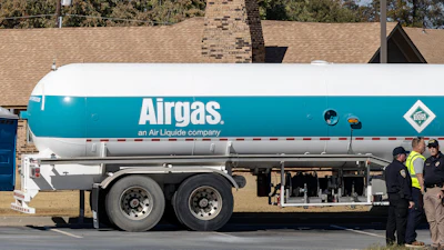 Crews check an Airgas tanker that leaked in the parking lot of a Holiday Inn Express in Weatherford, Okla., Nov. 13, 2025.