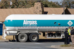 Crews check an Airgas tanker that leaked in the parking lot of a Holiday Inn Express in Weatherford, Okla., Nov. 13, 2025.