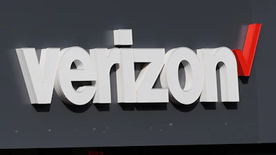 A Verizon sign is displayed on a store, Sept. 30, 2025, in Cambridge, Mass.