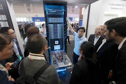 Visitors listen to the introduction of NVIDIA GB300 NVL72 AI server during the Hon Hai Tech Day (HHTD 25) at the Nangang Exhibition Center in Taipei, Taiwan, Friday, Nov. 21, 2025.