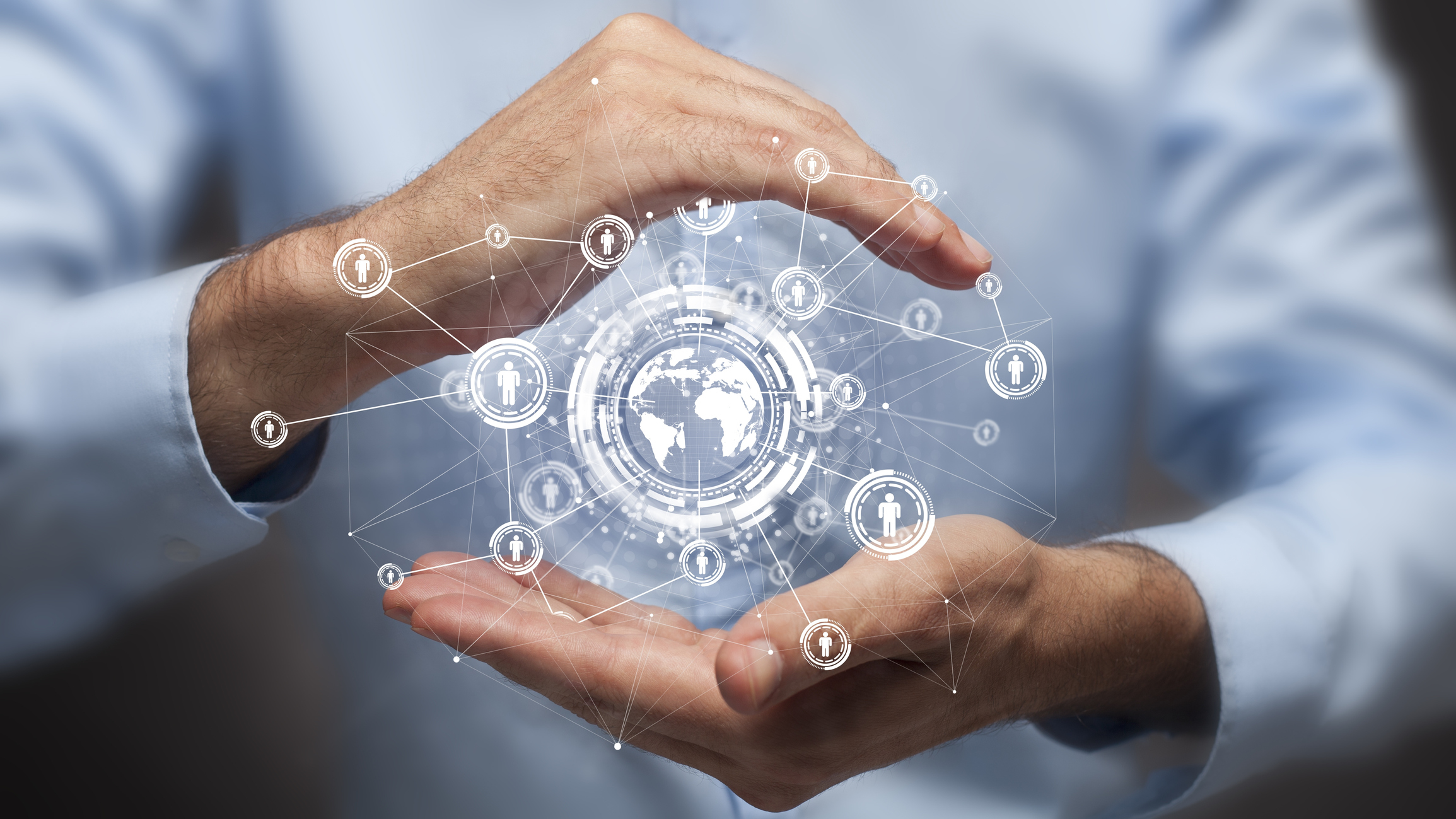 Businessman Holding In Hand A Global Connection,communications Concept 586934950 2313x1301 (1)