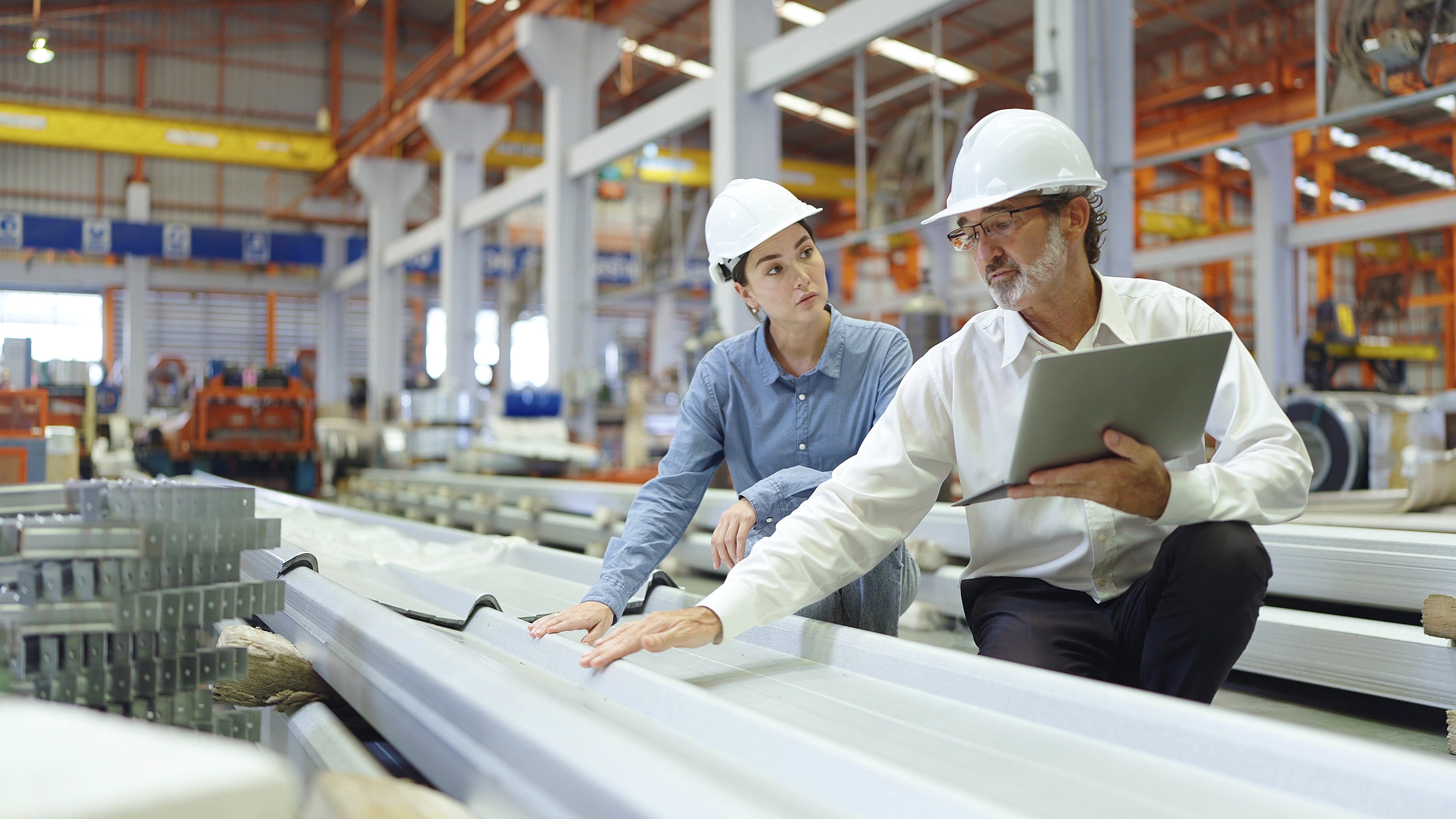 Manufacturing production planners on the factory floor.