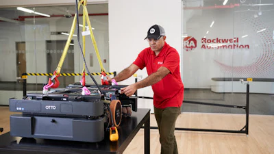 A worker at Rockwell Automation headquarters in Milwaukee assembling the OTTO 600.