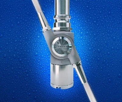 Metallic industrial valve or precision mechanical component on blue gradient
