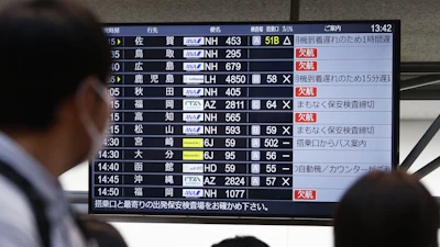 The departures display board shows All Nippon Airways' multipule flights cancellation at Haneda airport in Tokyo Saturday, Nov. 29, 2025.
