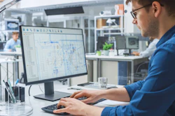 Engineer working with CAD software.