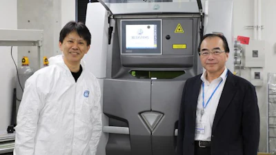 Naoki Takata of Nagoya University, lead researcher on the project (left), and Masaki Kato, senior author and division head of Aichi Center for Industry and Science Technology (right), with the center's laser 3D printer that creates stronger, heat-resistant aluminum alloys layer by layer.