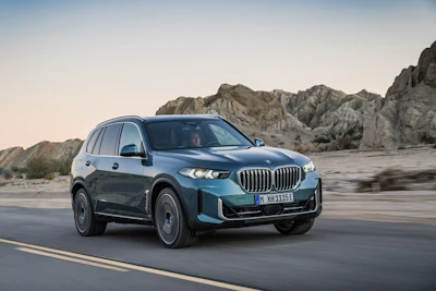 This photo provided by BMW shows the 2026 BMW X5. The xDrive50e version features an available powerful hybrid powertrain that contributes to its sporty driving dynamics.