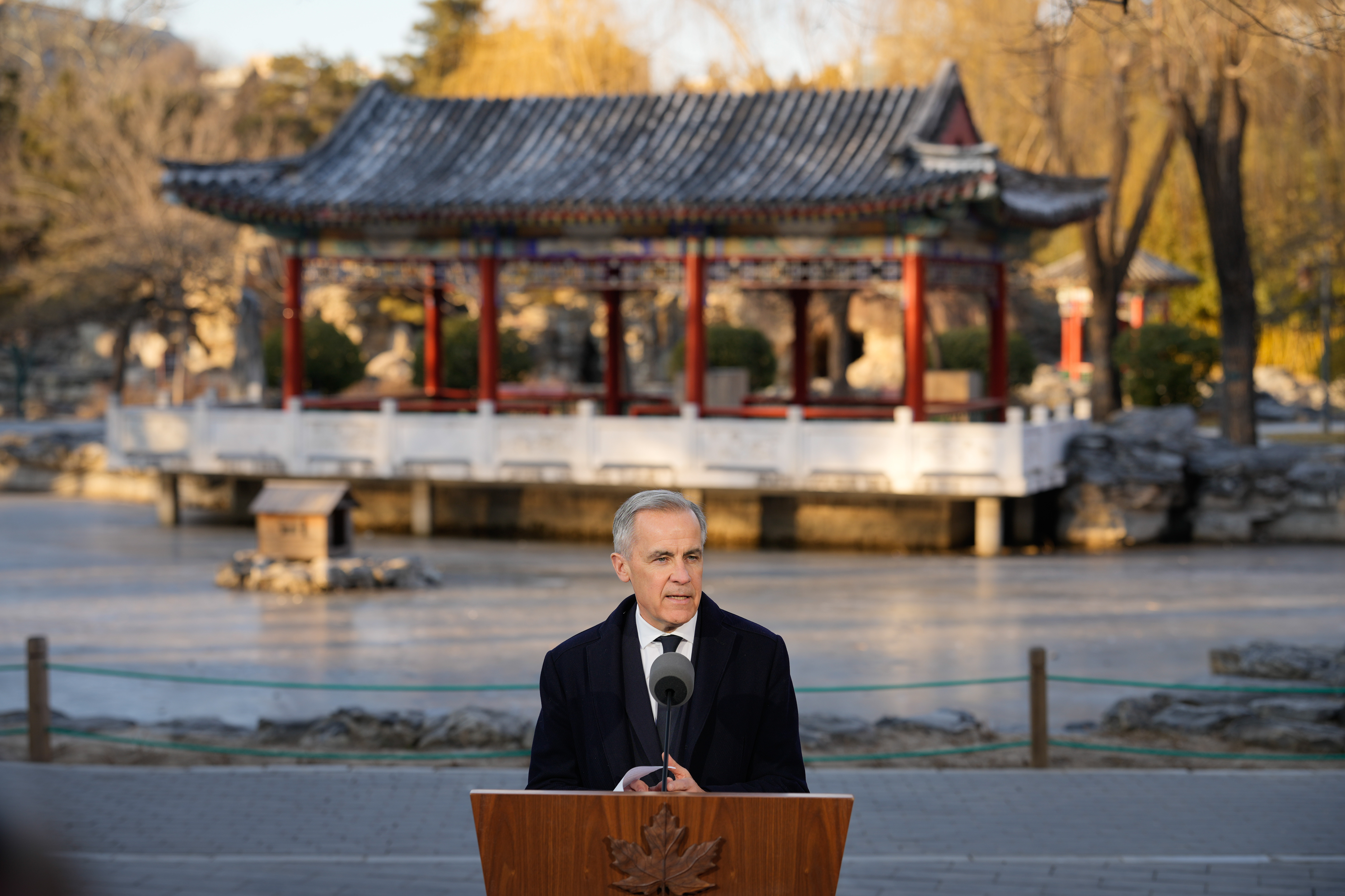 Canada's Prime Minister Mark Carney, speaks to the media at Ritan Park in Beijing, China, Friday, Jan. 16, 2026.