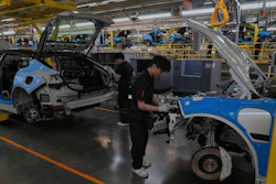Workers assemble the Zeekr 001 EV models at the Chinese automaker Zeekr assembly plant in Ningbo, east China's Zhejiang Province, April 17, 2025.