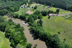 Faye Jackson has lived for decades on a patch of rural land, right, in Resaca, Ga., on the banks of the Conasauga River, seen on Thursday, May 8, 2025.