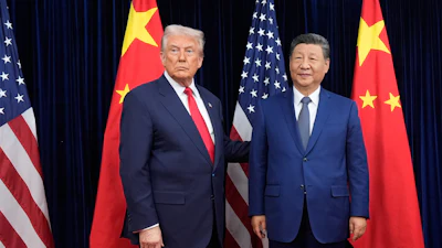 President Donald Trump and Chinese President Xi Jinping pose ahead of their summit talk at Gimhae International Airport, Busan, South Korea, Oct. 30, 2025.