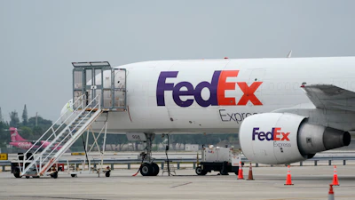 A FedEx cargo plane is shown on the tarmac at Fort Lauderdale-Hollywood International Airport, Tuesday, April 20, 2021, in Fort Lauderdale, Fla.