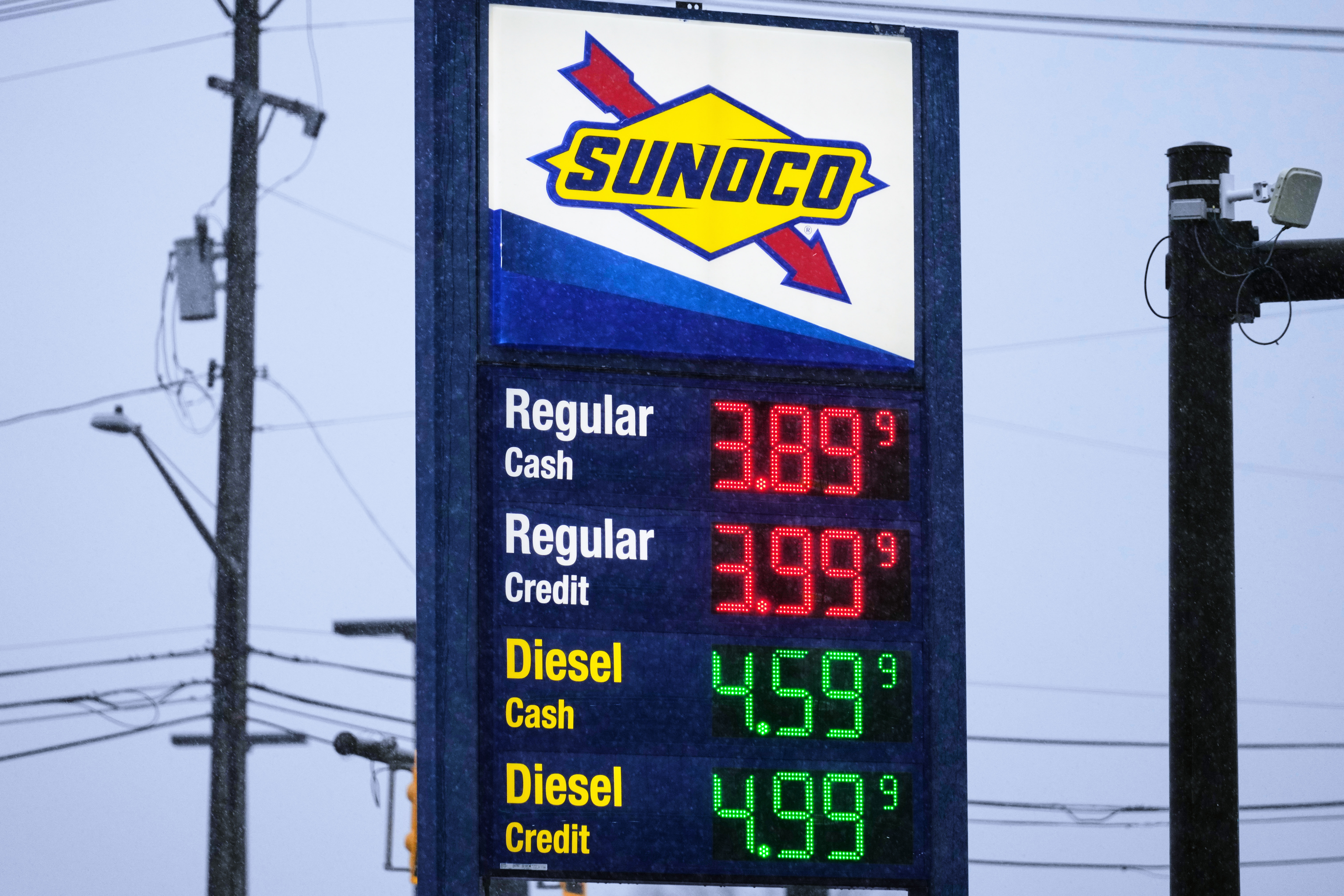 Ray Ruda fills his van with fuel at a gas station Wednesday, March 25, 2026, in Brentwood, Tenn.