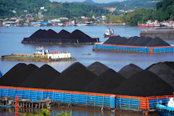 Barges fully loaded with coal are anchored on Mahakam river in Samarinda, East Kalimantan, Indonesia, on Dec. 19, 2022.