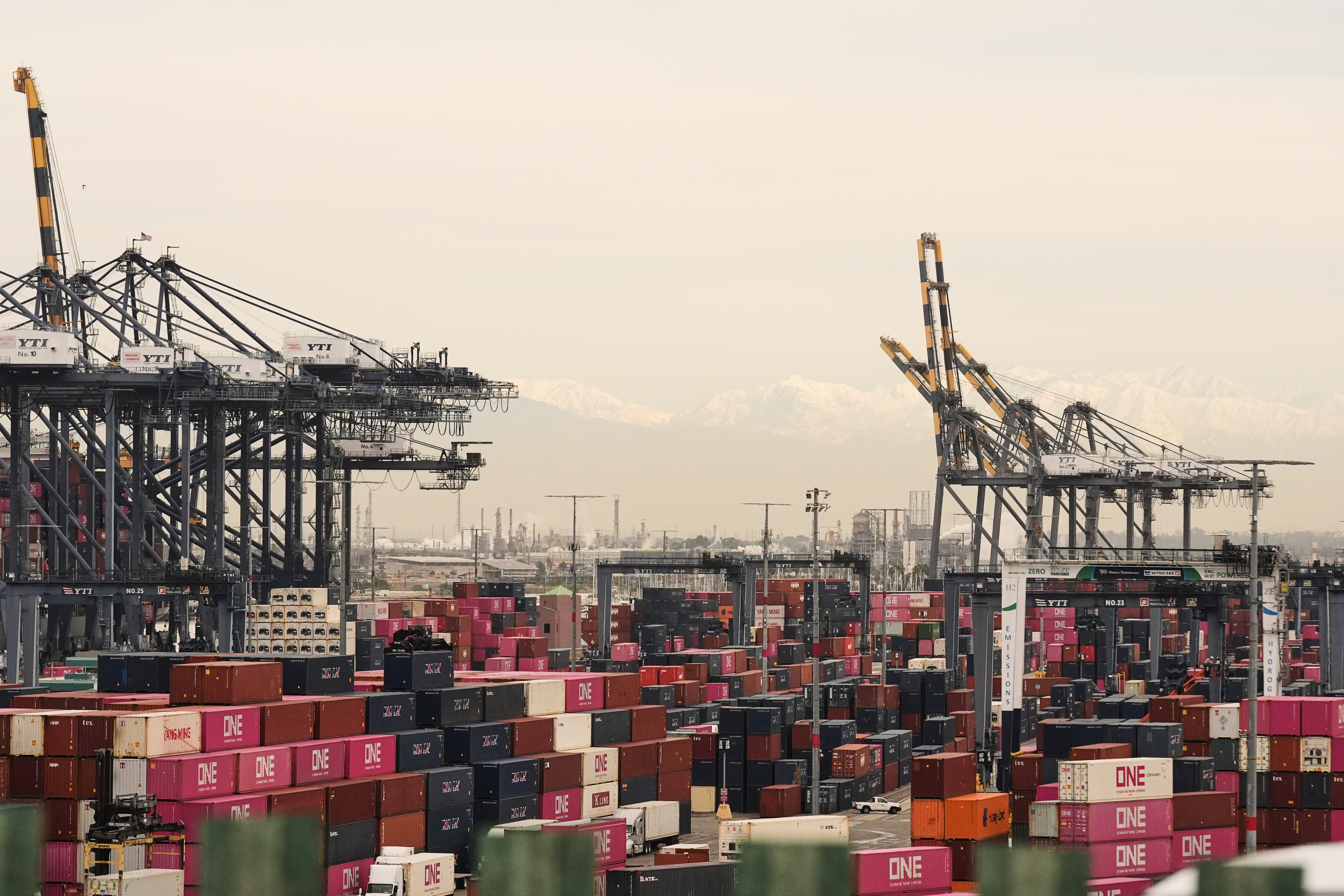 Containers are stacked at the Port of Los Angeles Friday, Feb. 20, 2026, in Los Angeles.