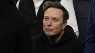 Elon Musk attends the finals for the NCAA wrestling championship, March 22, 2025, in Philadelphia.