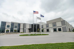 Three Flags Fly Outside A Novartis Manufacturing Facility
