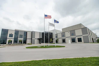 Three Flags Fly Outside A Novartis Manufacturing Facility