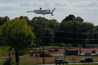 A drone operated by Zipline flies to make a delivery from a Walmart store in Pea Ridge, Ark., Friday, Sept. 26, 2025.