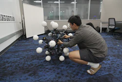 Jiaxun Liu, a Ph.D. student, works on a robot named Argus at Duke University's General Robotics Lab in Durham, N.C., Tuesday, May 26, 2026.
