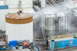 Water is sprayed on a damaged tank at GKN Aerospace in Garden Grove, Calif., on Sunday, May 24, 2026, after the tank containing a chemical used to make plastic parts overheated Thursday.